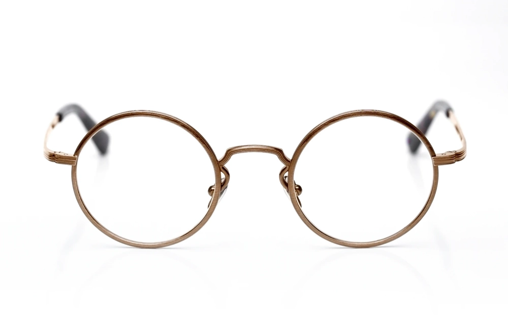 Alf – Model 24-25-105 – runde antikgoldene Titanbrille made in Japan – designed in Frankreich – Kitschenberg Brillen
