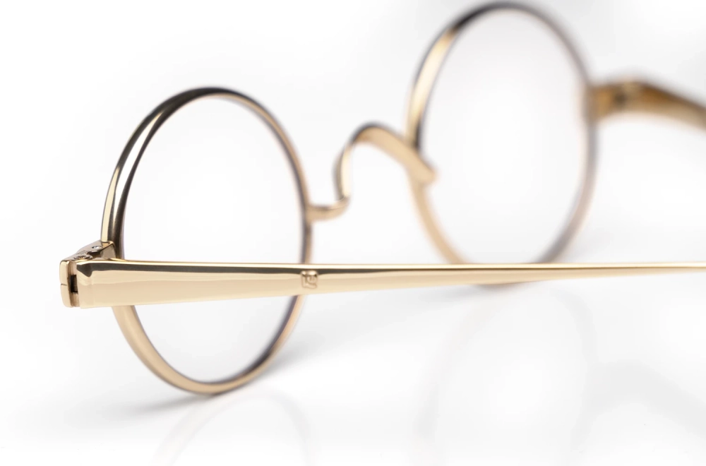 Goldene runde Brille aus Blocktitan von Ducloux – Model Numisma – Kitschenberg