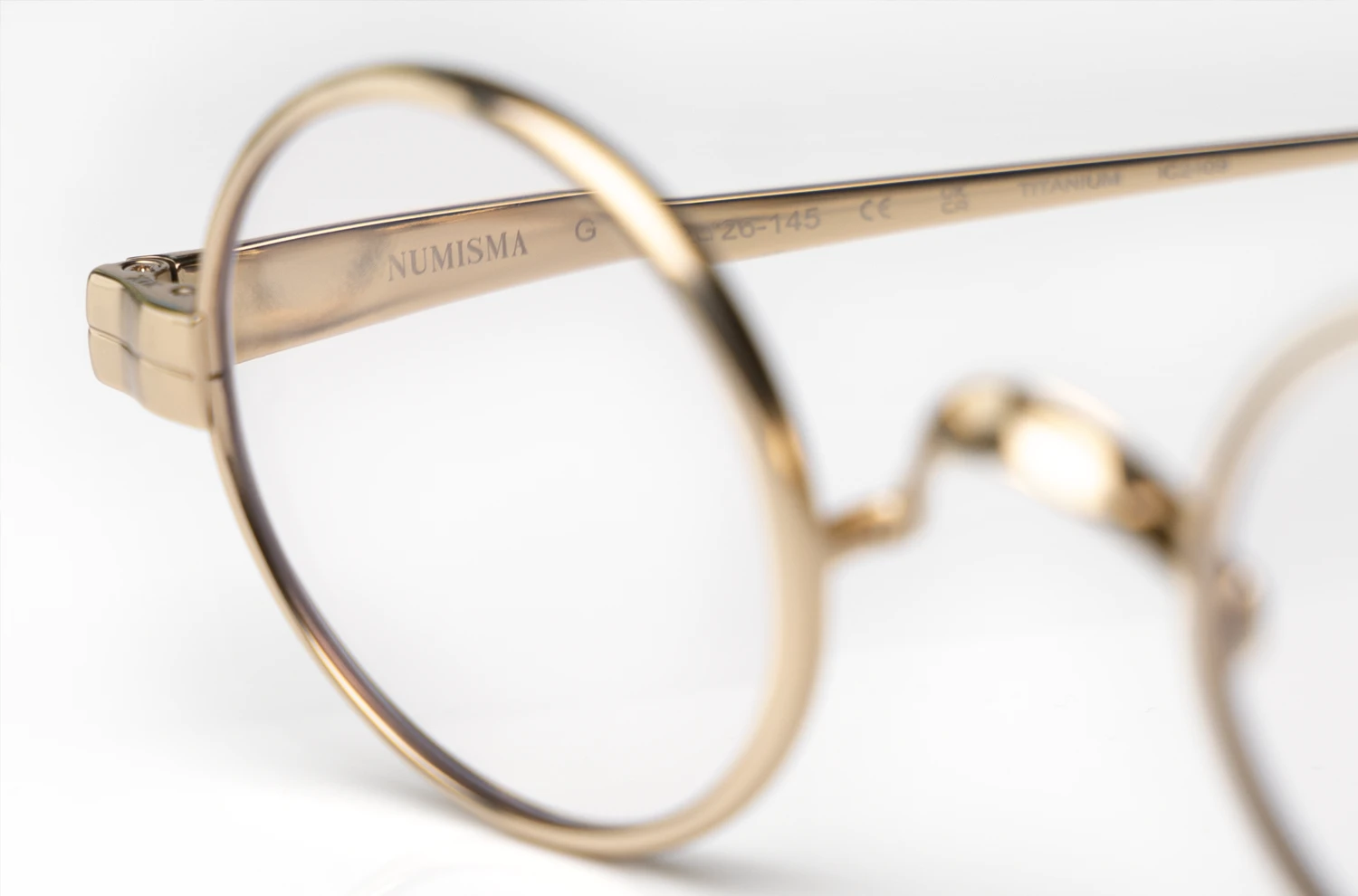 Runde Brille von Ducloux Numisma aus Blocktitan in gold – made in Japan - Kitschenberg